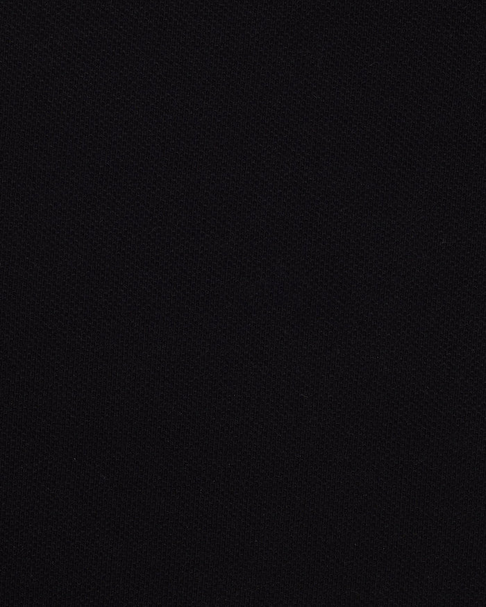 Close up of the custom oxford polo shirt for men by Luxire in black pique