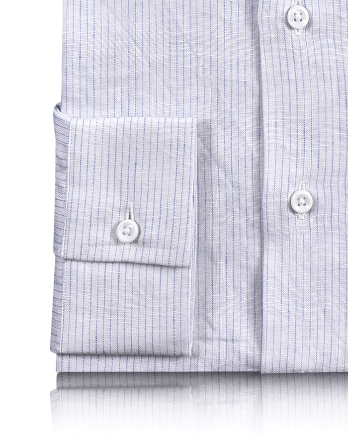 Cuff of the custom linen shirt for men in white with thin blue stripes by Luxire Clothing