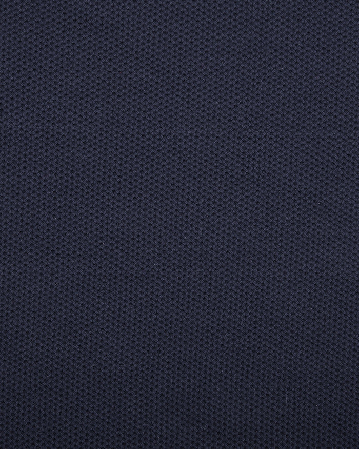 Close up of the custom oxford polo shirt for men by Luxire in midnight blue 2
