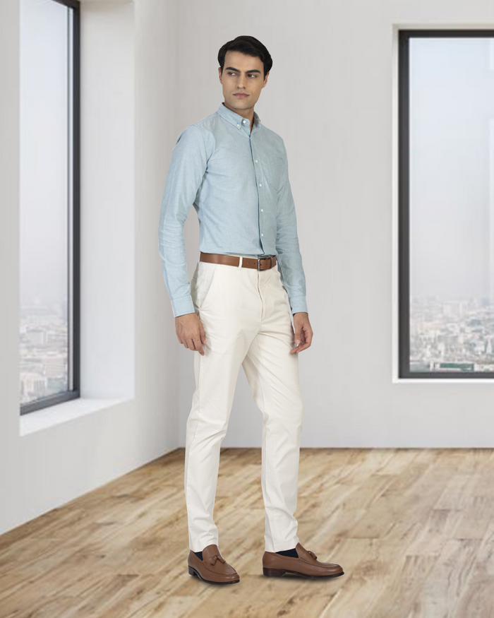 Side of model wearing the custom oxford shirt for men by Luxire in mint green