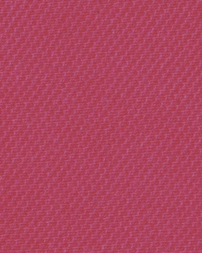 Close up of the custom oxford polo shirt for men by Luxire in pink