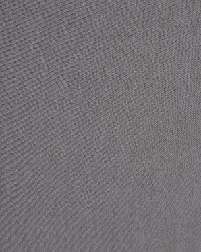 Close up of the custom oxford polo shirt for men by Luxire in soft grey