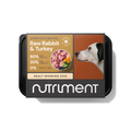 Labeled "Raw Rabbit & Turkey 500g," this premium dog food pack features a dog image and meat chunks.