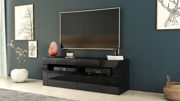 TV STAND DACO 2 BLACK GLOSS FRONTS 140CMDepth: 40 cmWidth: 140 cmHeight: 45 cmMinimalist designThe cabinet has 2 functional and roomy storage compartments.The furniture has high gloss lacquered fronts and the body of the furniture is matt.A modern RTV tab