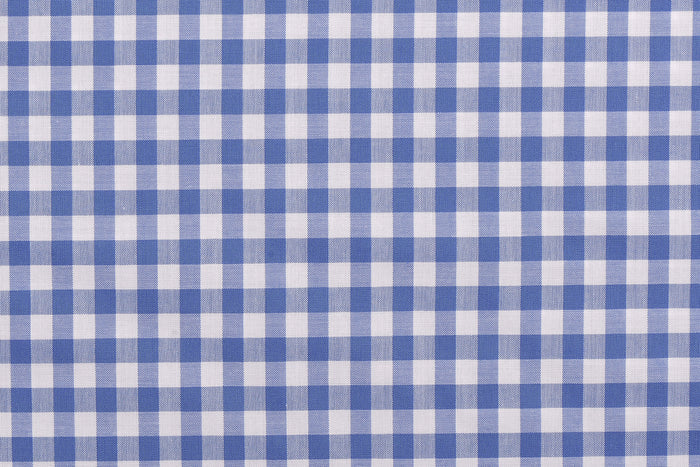 Closeup view of custom check shirts for men by Luxire light blue checks on white